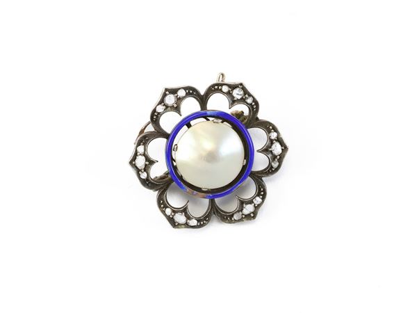 A silver, low title gold, diamond roses, enamel and mother of pearl brooch