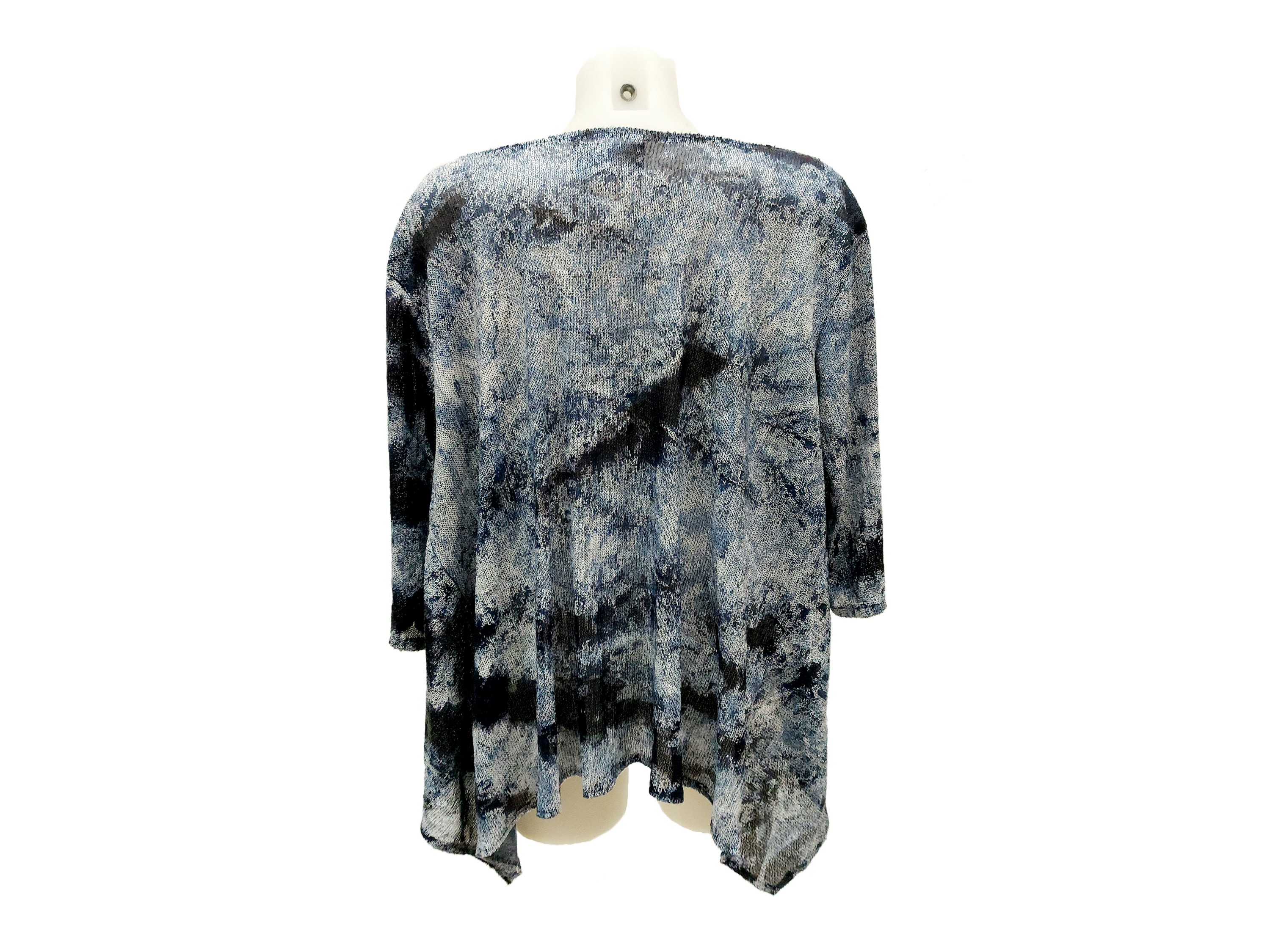 Tunica in micropaillettes bianche e nei toni del blu