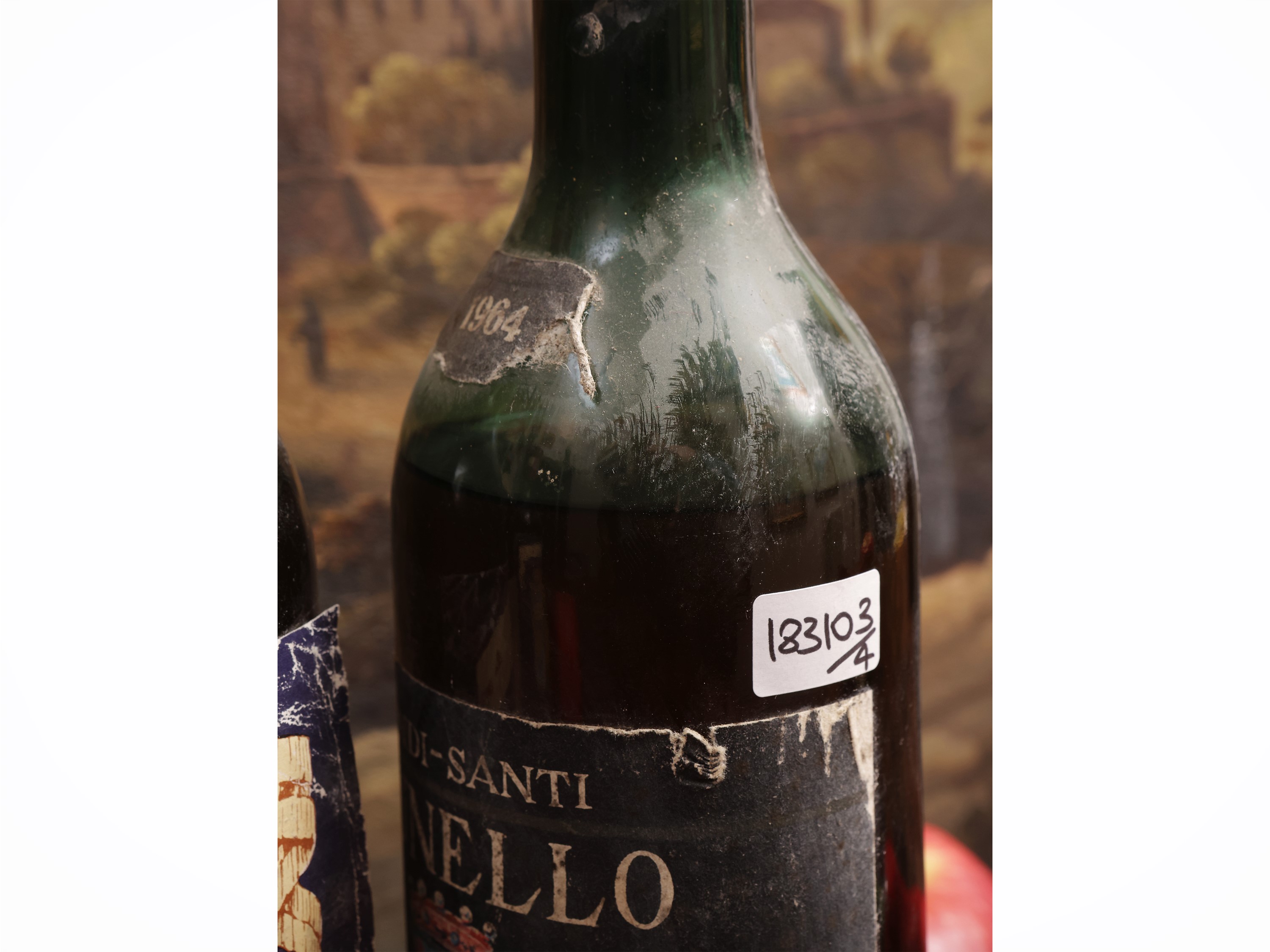 Quattro bottiglie di vini rossi di pregio