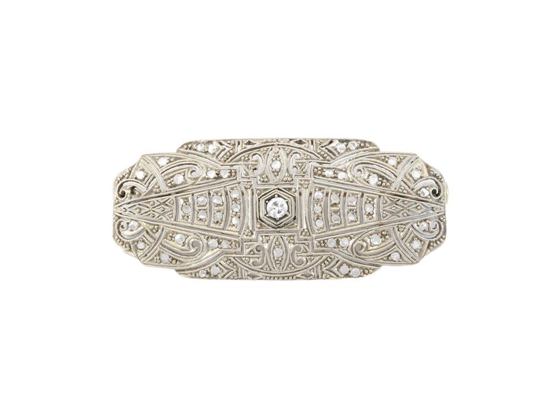 Spilla in oro bianco e piccoli diamanti