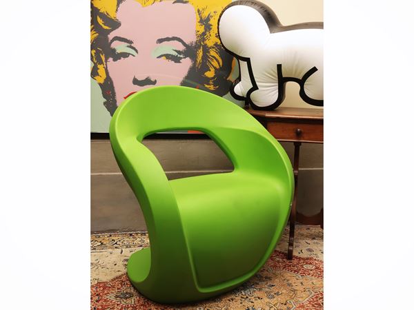 Green plastic armchair