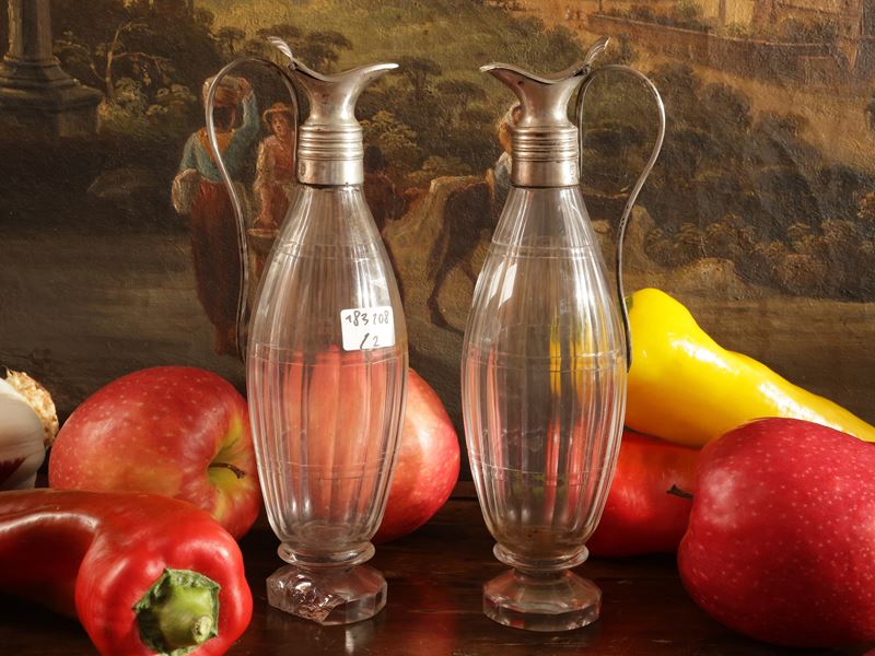 Coppia di piccole ampolle in argento e vetro