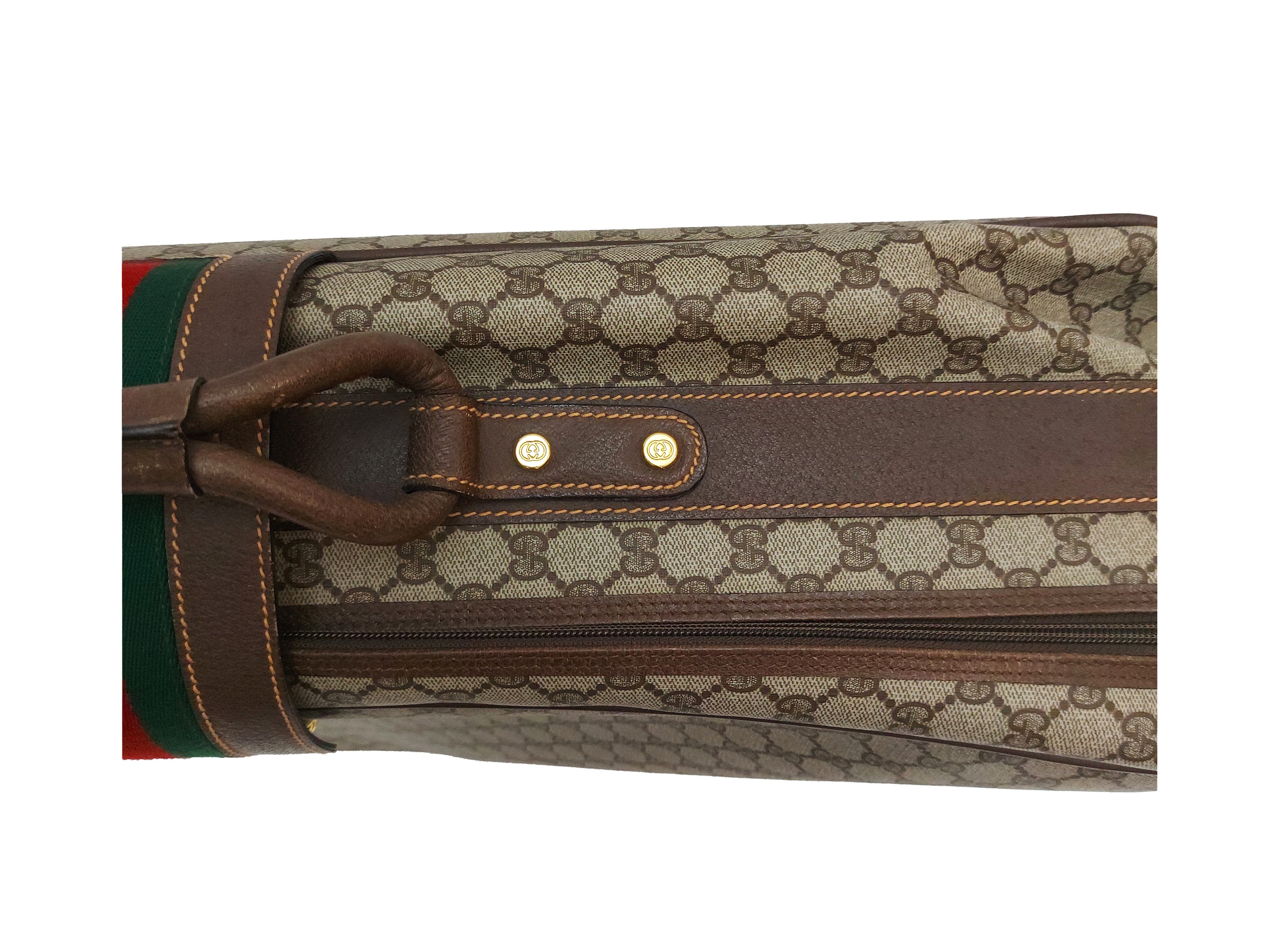 Gucci, Valigia in tela monogram marrone con finiture in pelle di cinghiale