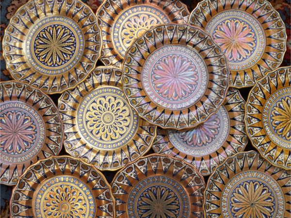 Series of twelve luster-glazed terracotta plates, Cantagalli