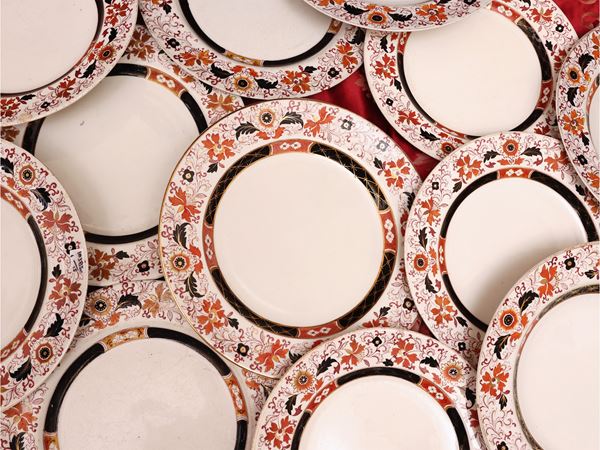 Series of fifteen decorative earthenware plates