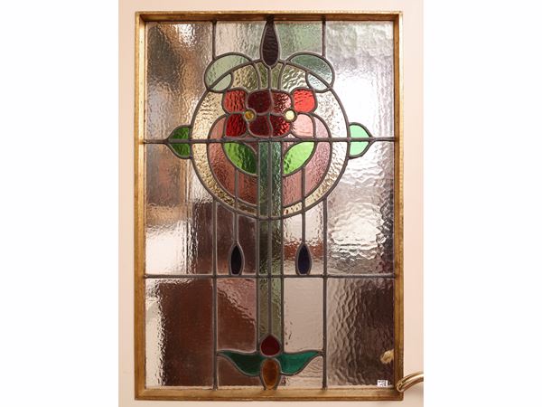 Two lead-bound glass panels