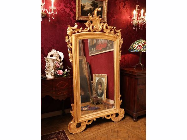 Specchiera in legno intagliato e dorato