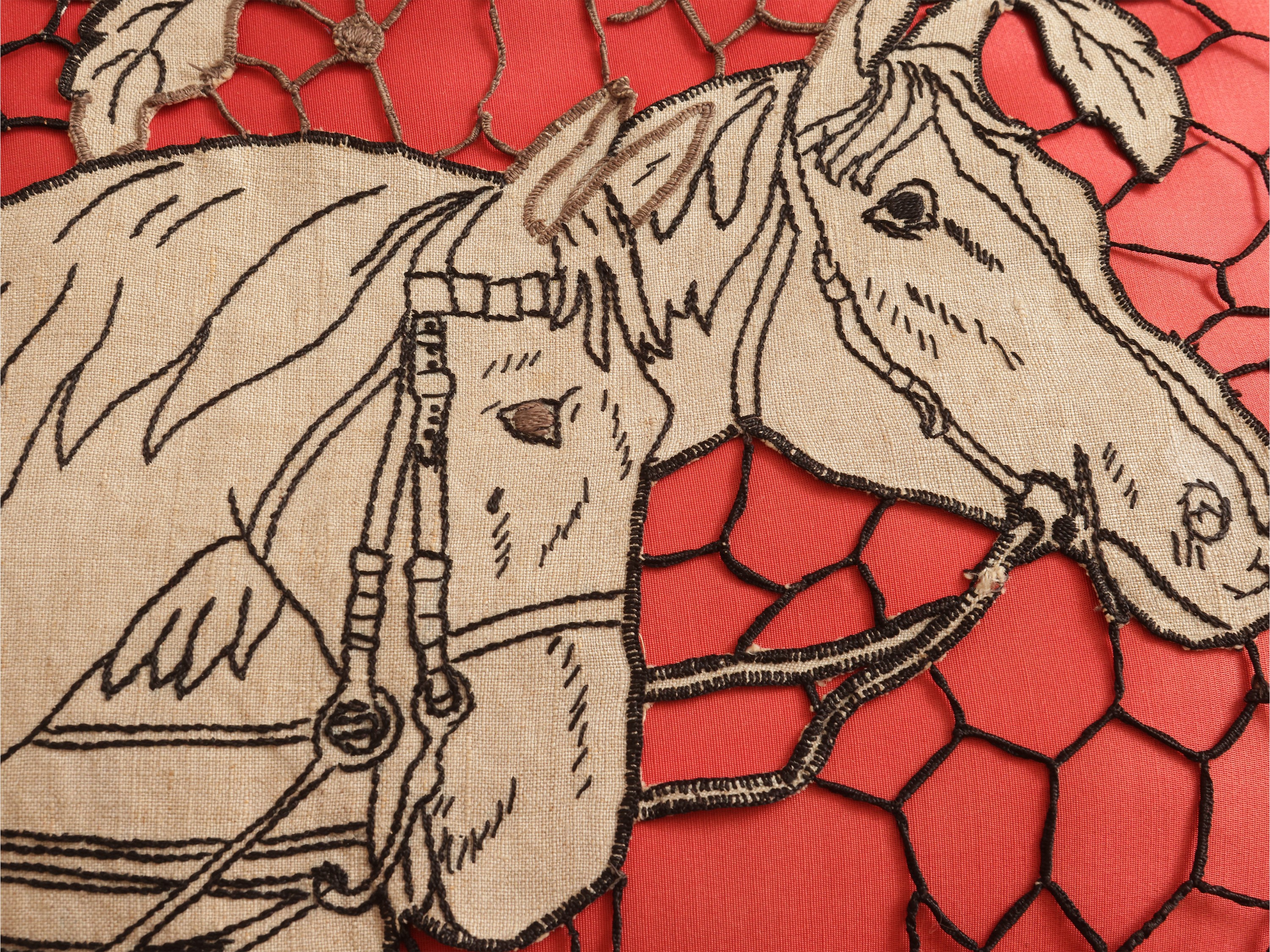 Tre cuscini, ricamo in seta rossa (soggetti equestre e floreali), cm 40x50 circa