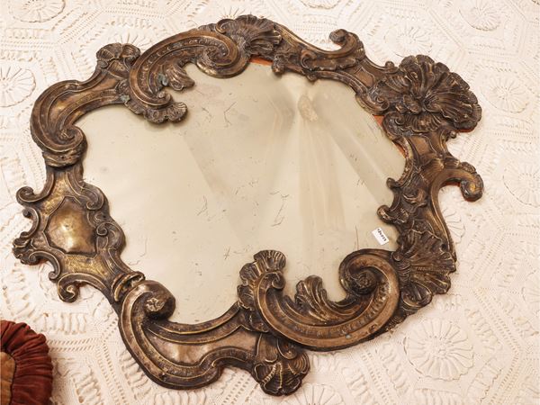 Small mirror with silver tole frame