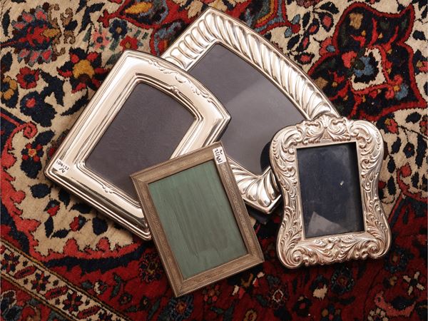 Four chiseled silver portrait frames