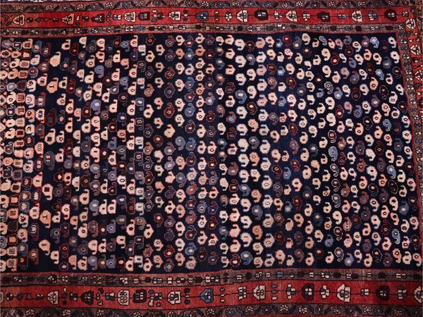 Old-fashioned Caucasian carpet