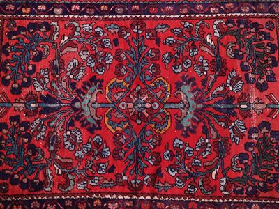 Tappeto Nain, campo rosso con motivi floreali multicolore