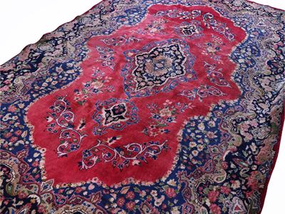 Grande tappeto persiano, campo blu con medaglione centrale su fondo rosso