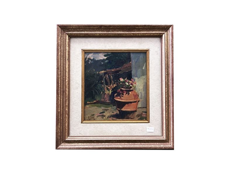 Scorcio di cortile con orcio