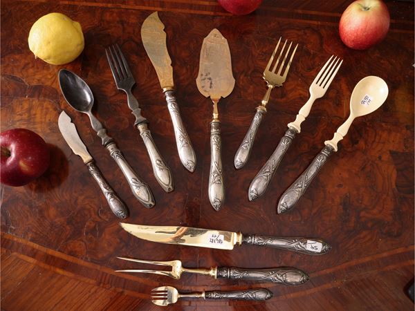 Set di posate da portata con manici rivestiti in argento