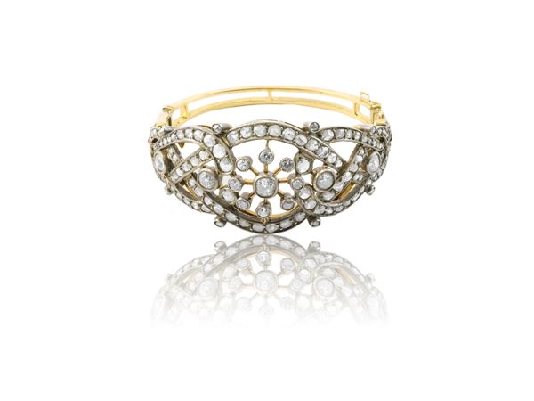 Bracciale a cerchio rigido in oro giallo, argento e diamanti