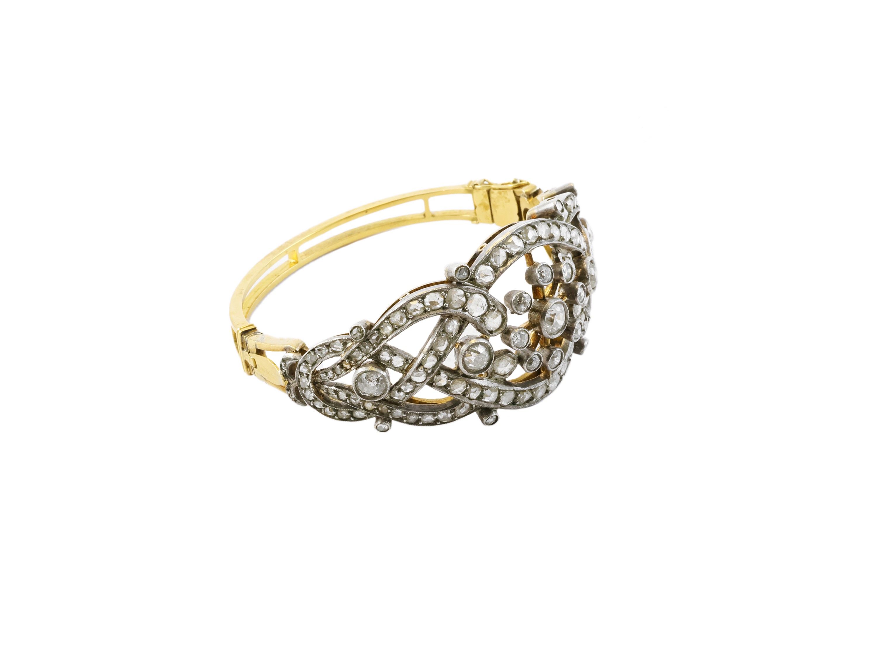 Bracciale a cerchio rigido in oro giallo, argento e diamanti