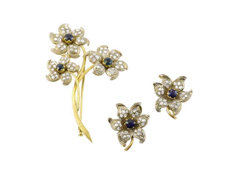 Demi parure in oro giallo, oro bianco, diamanti e zaffiri