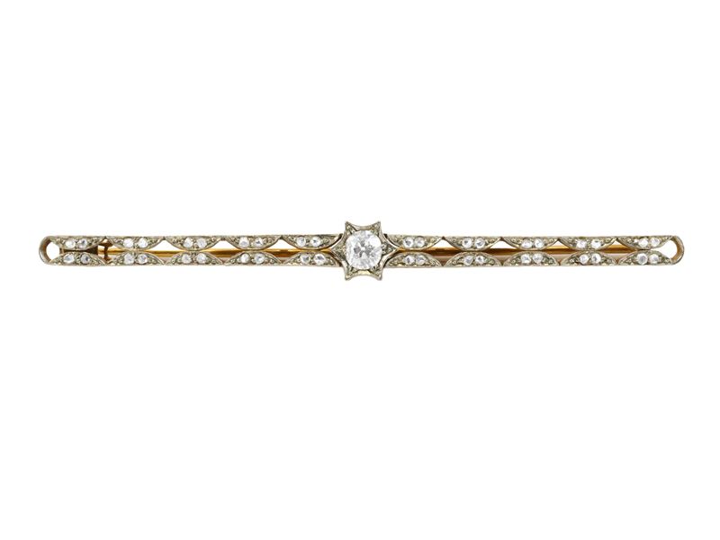 Spilla in oro giallo, rose di diamante e diamante