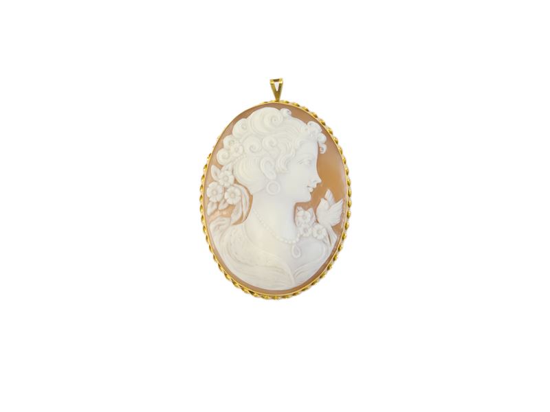 Spilla pendente con cammeo in conchiglia e montatura in oro