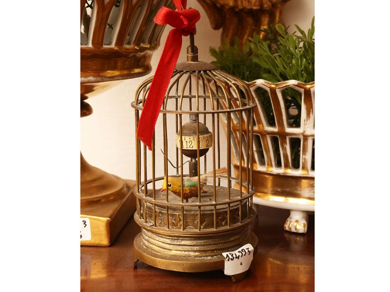 Piccolo orologio da tavolo a foggia di gabbietta