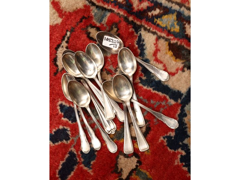 Due set di cucchiaini in argento