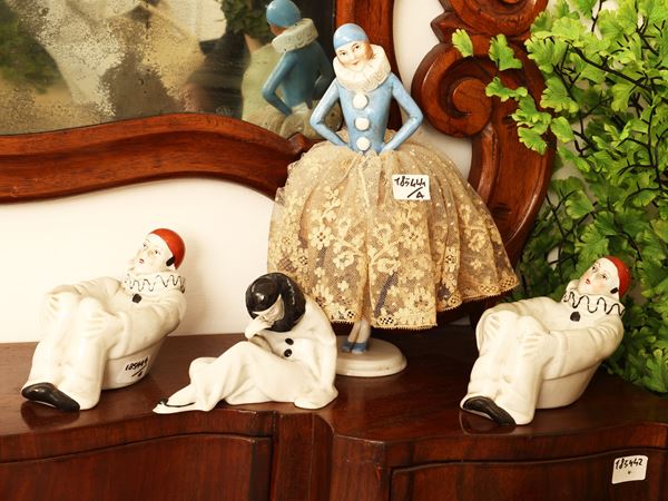 Quattro figure da collezione in porcellana
