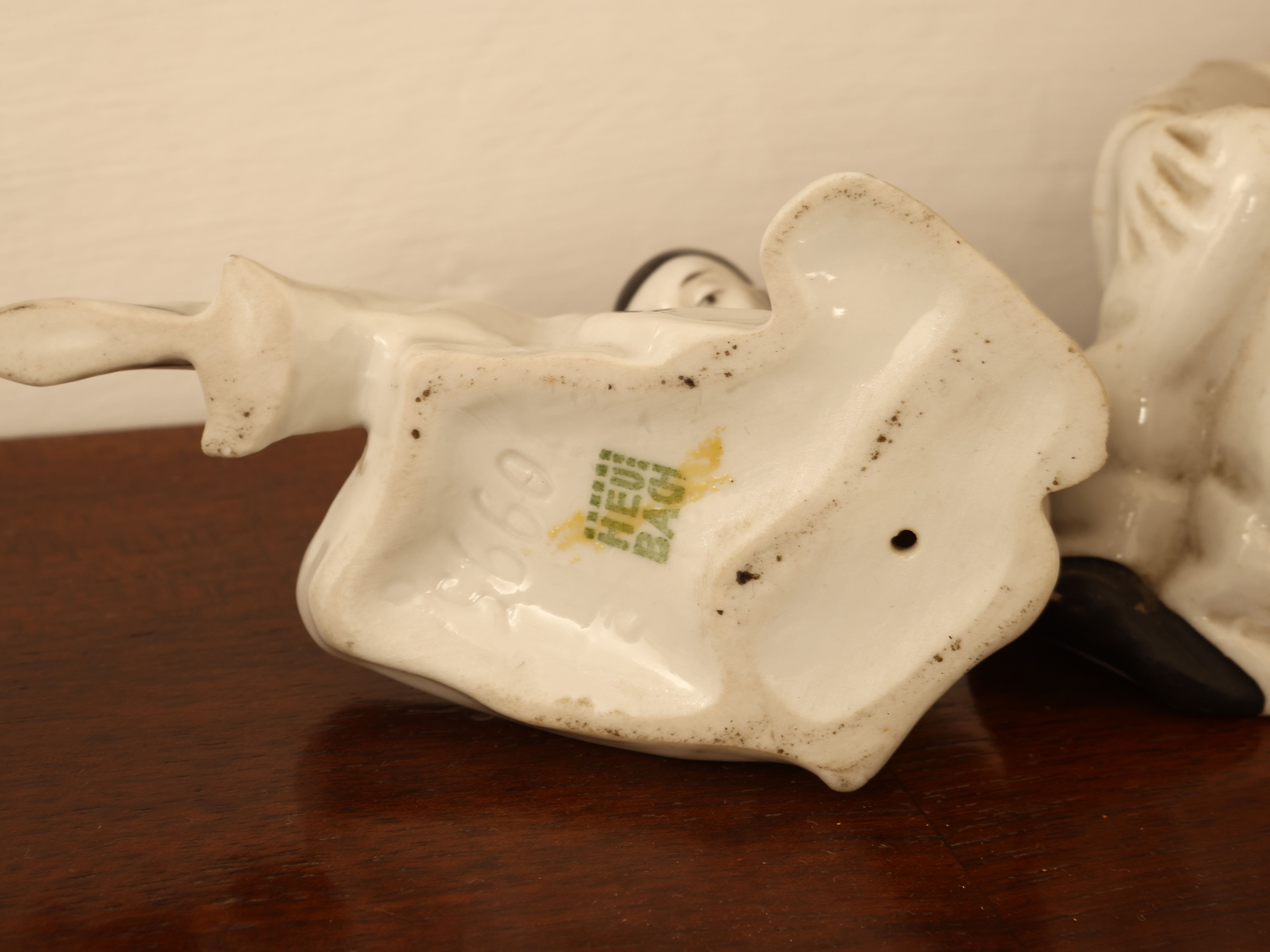Quattro figure da collezione in porcellana raffiguranti Pierrot, inizio del XX secolo