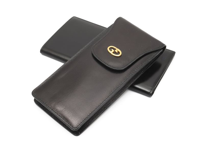 Gucci - Lotto di accessori in pelle spazzolata nera