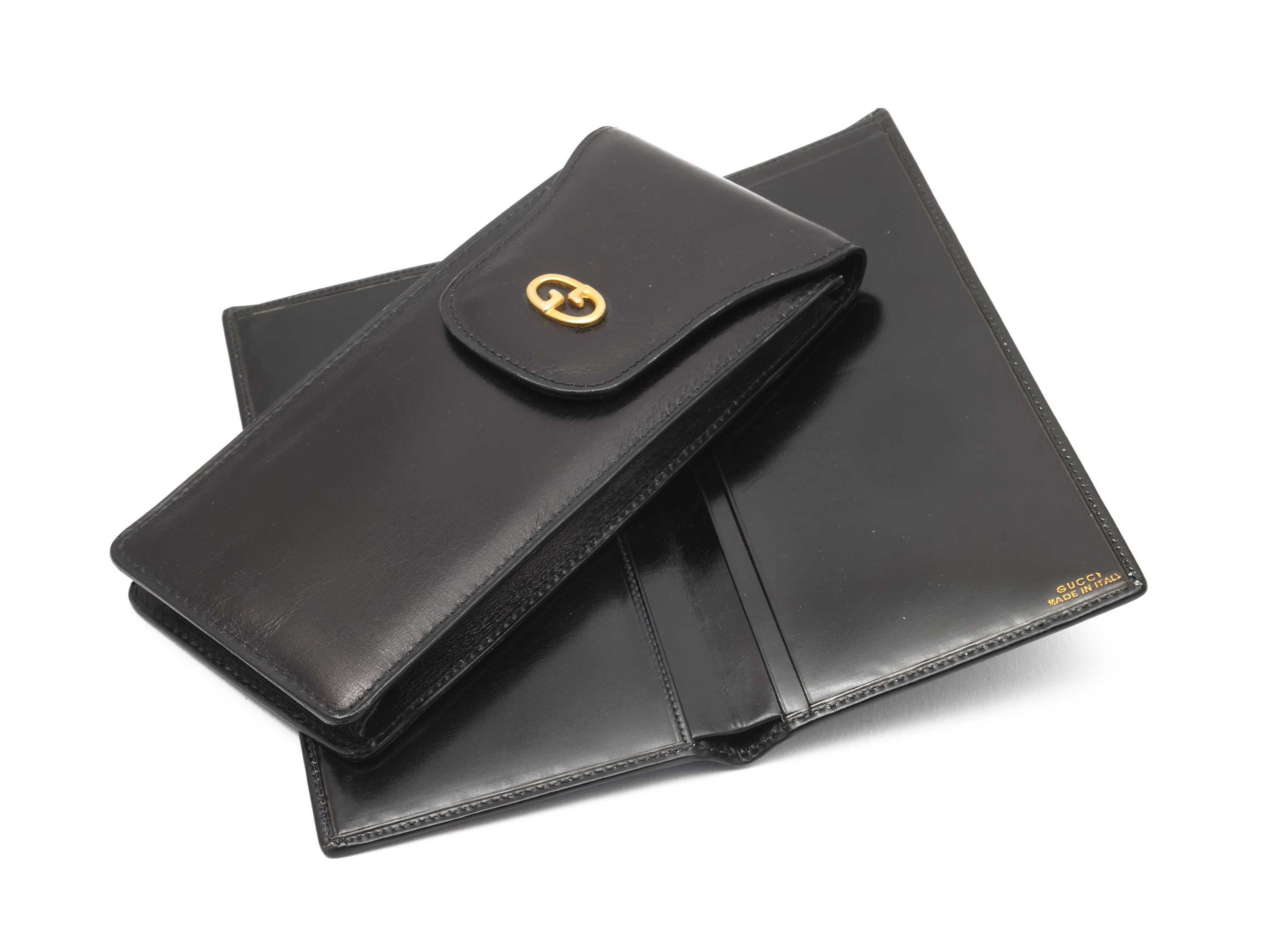 Gucci - Lotto di accessori in pelle spazzolata nera