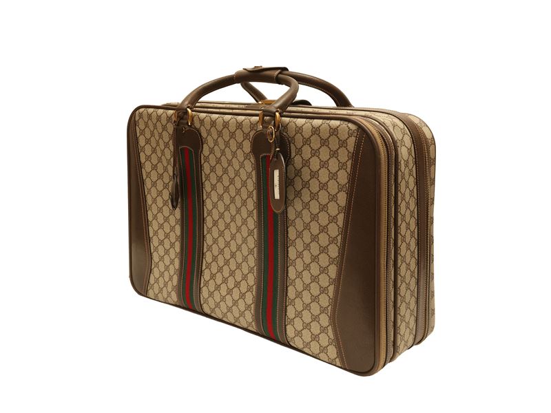 Gucci - Valigia in tessuto GG marrone