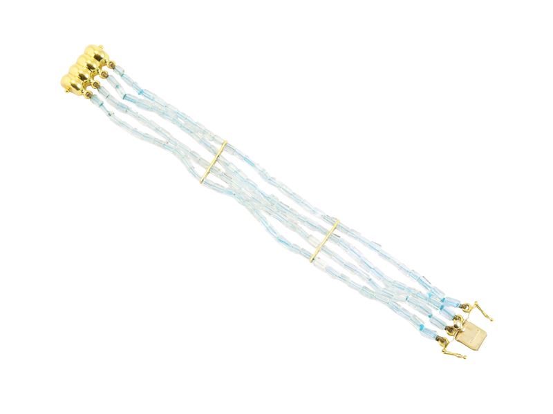 Bracciale in oro giallo e pietre incolori