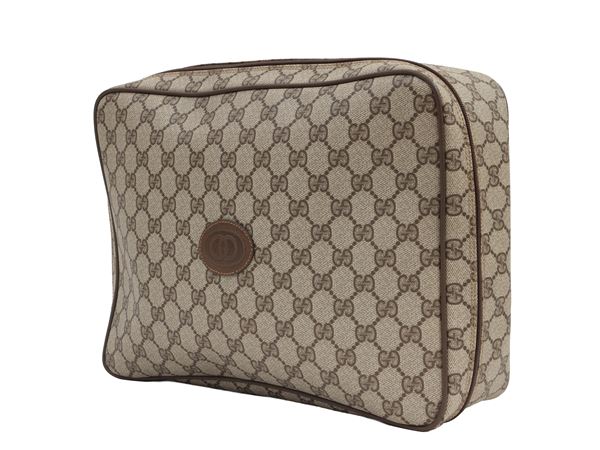 Gucci - Necessaire in tessuto GG marrone
