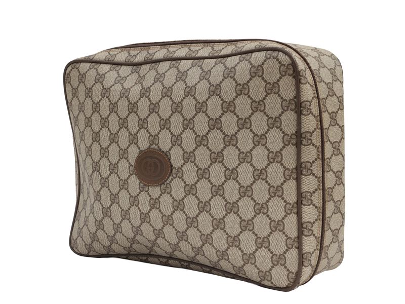 Gucci - Necessaire in tessuto GG marrone