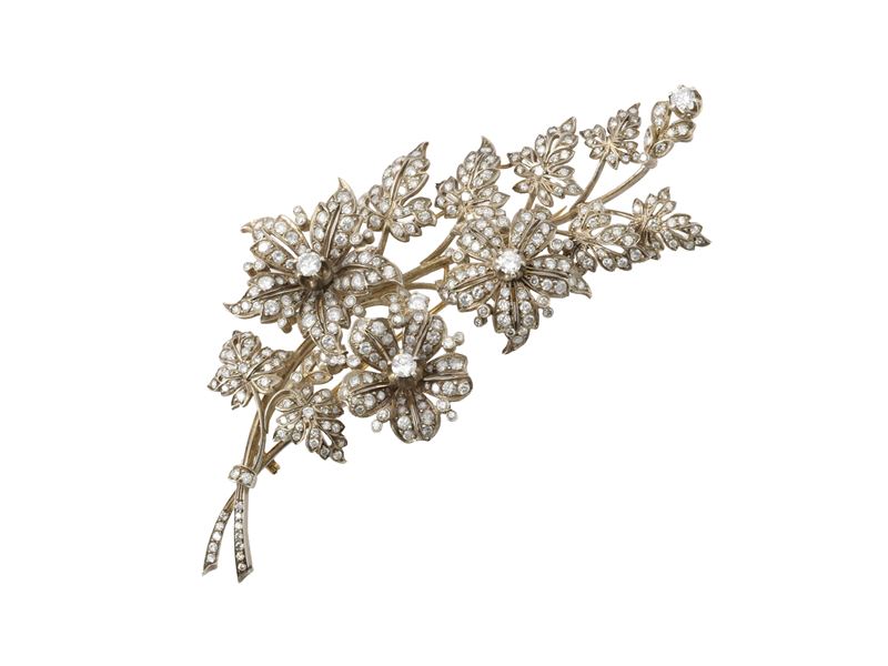 Spilla 'en tremblant' in oro giallo, argento e diamanti