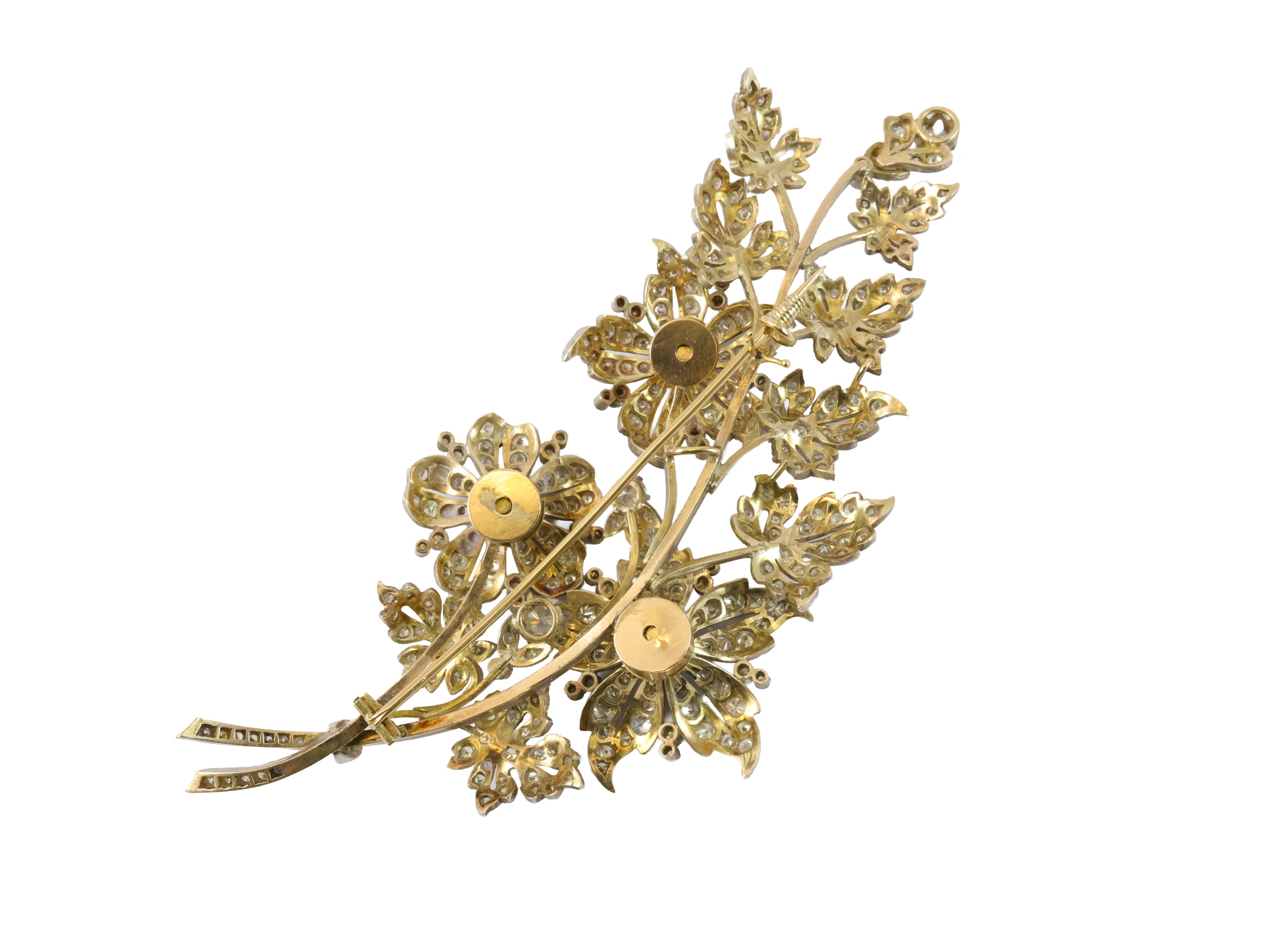 Spilla 'en tremblant' in oro giallo, argento e diamanti