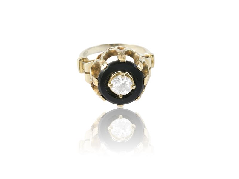 Anello in oro bianco, onice e diamante