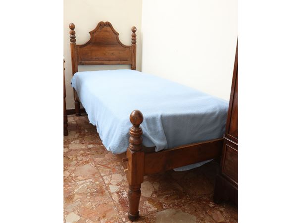 Pair of single walnut beds