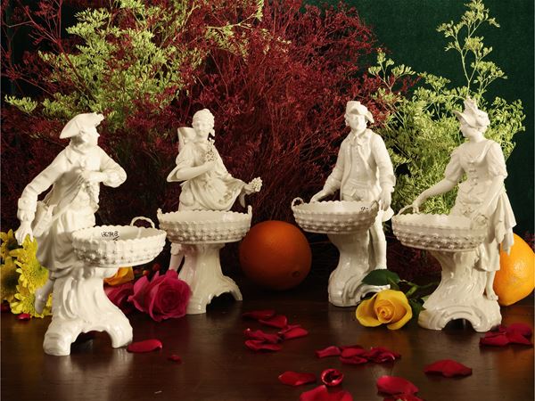Series of four refined allegorical porcelain figures