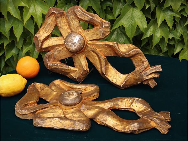Pair of decorative friezes in carved and gilded wood