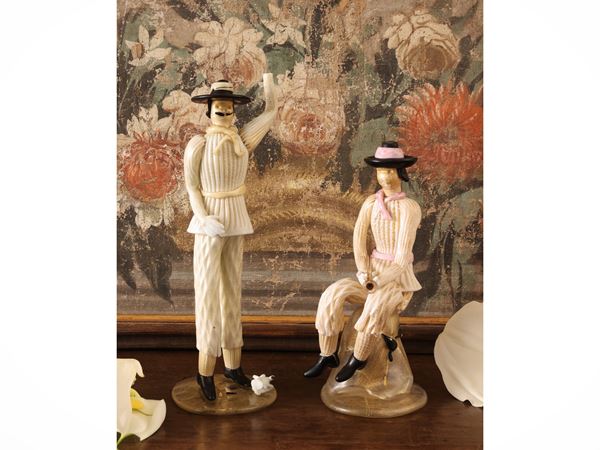 Two male figures in blown glass