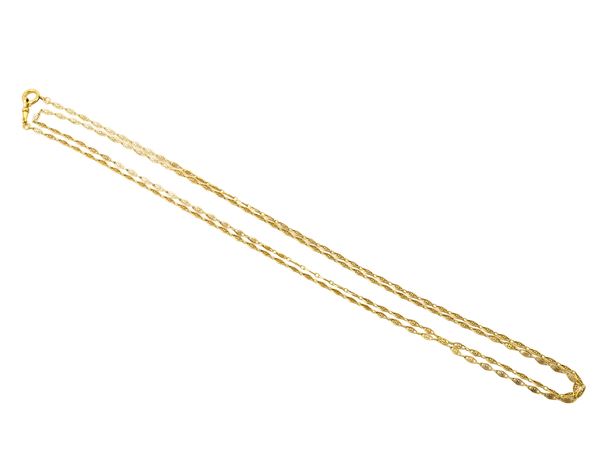 Lunga catena in oro giallo 18Kt