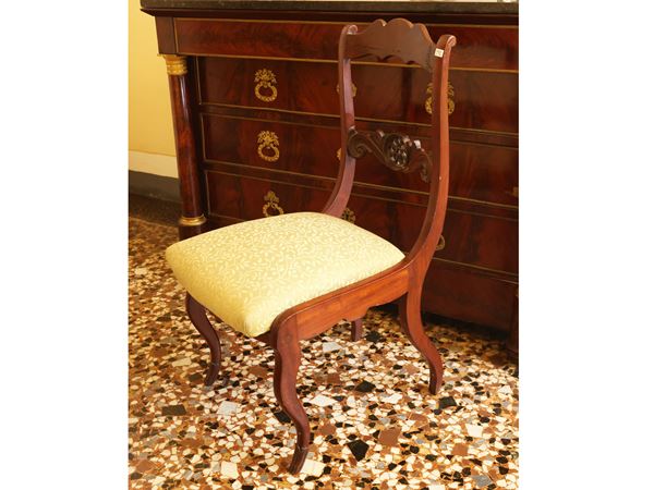 Series of three walnut chairs