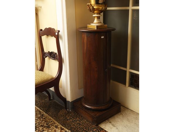 Column veneered in walnut and walnut feather