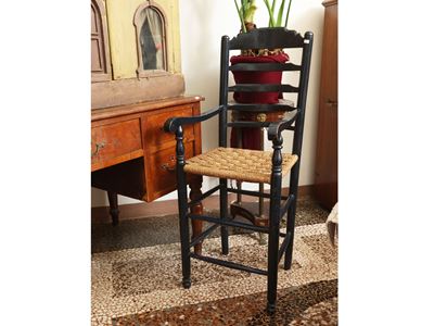 Poltroncina rustica, legno ebanizzato e sedile impagliato con cordonetto, XIX/XX secolo