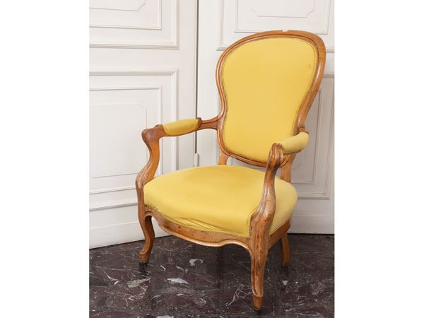 Two walnut armchairs