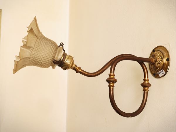 Pair of golden metal appliques