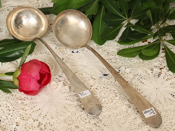 Two silver ladles