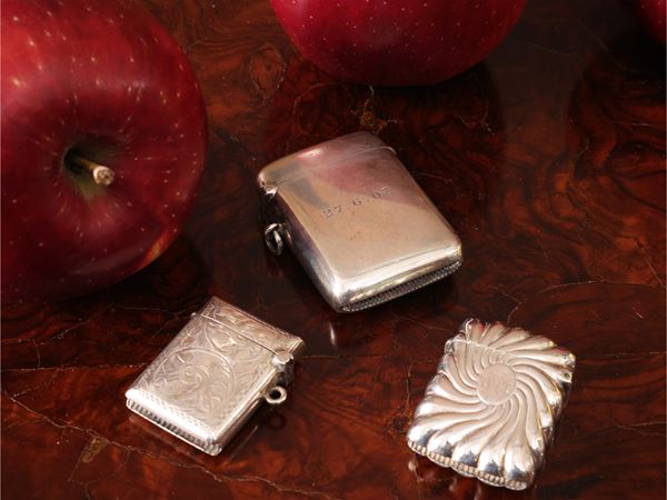 Tre portafiammiferi in argento