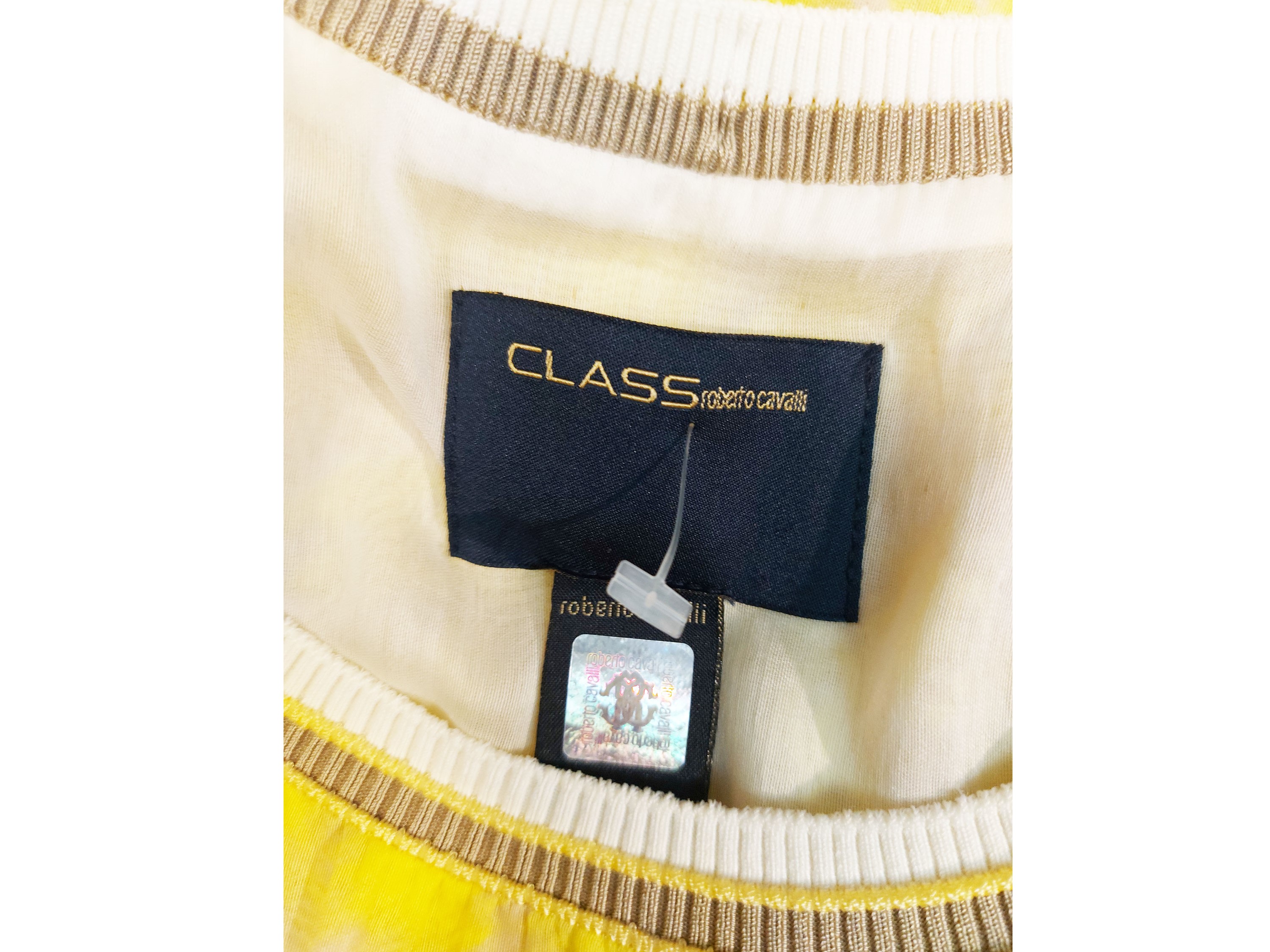 Roberto Cavalli, Abito in chiffon di seta animalier giallo con balza floreale e ologramma di aute...